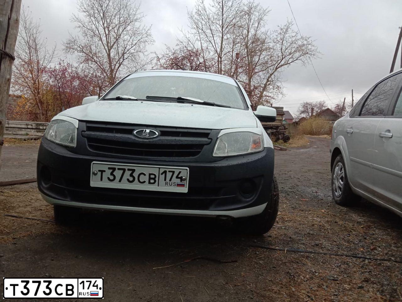 Фото автомобиля LADA 2190 GRANTA, 2013 — госномер Н282НВ45. Цвет: Белый