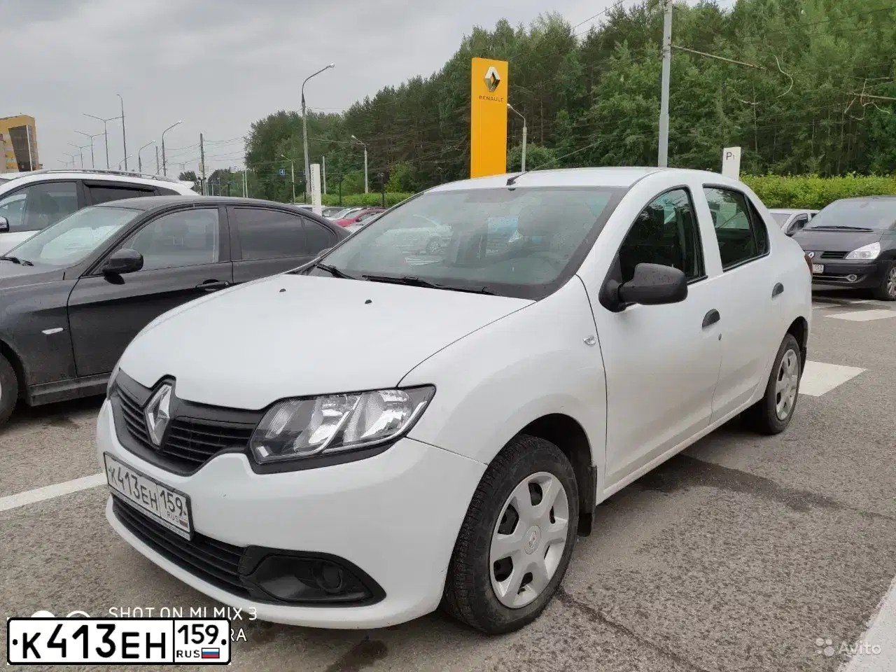 Фото автомобиля RENAULT T LOGAN, 2015 — госномер К413ЕН159. Цвет: Белый
