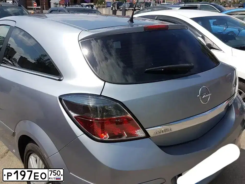 Фото автомобиля OPEL ASTRA, 2008 — госномер С534АТ790. Цвет: СЕРЫЙ