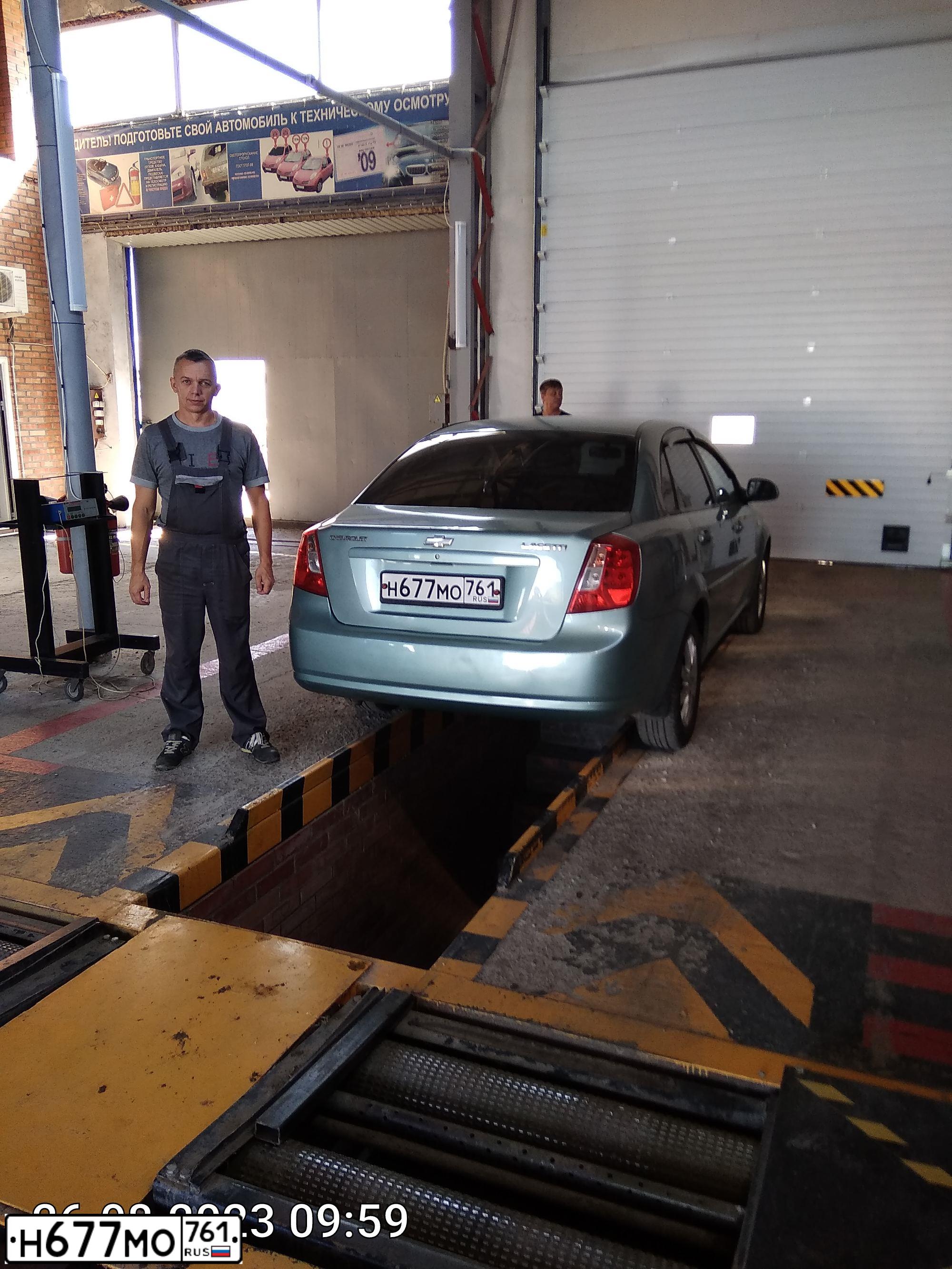 Фото автомобиля CHEVROLET LACETTI, 2008 — госномер Н677МО761. Цвет: ЗЕЛЕНЫЙ
