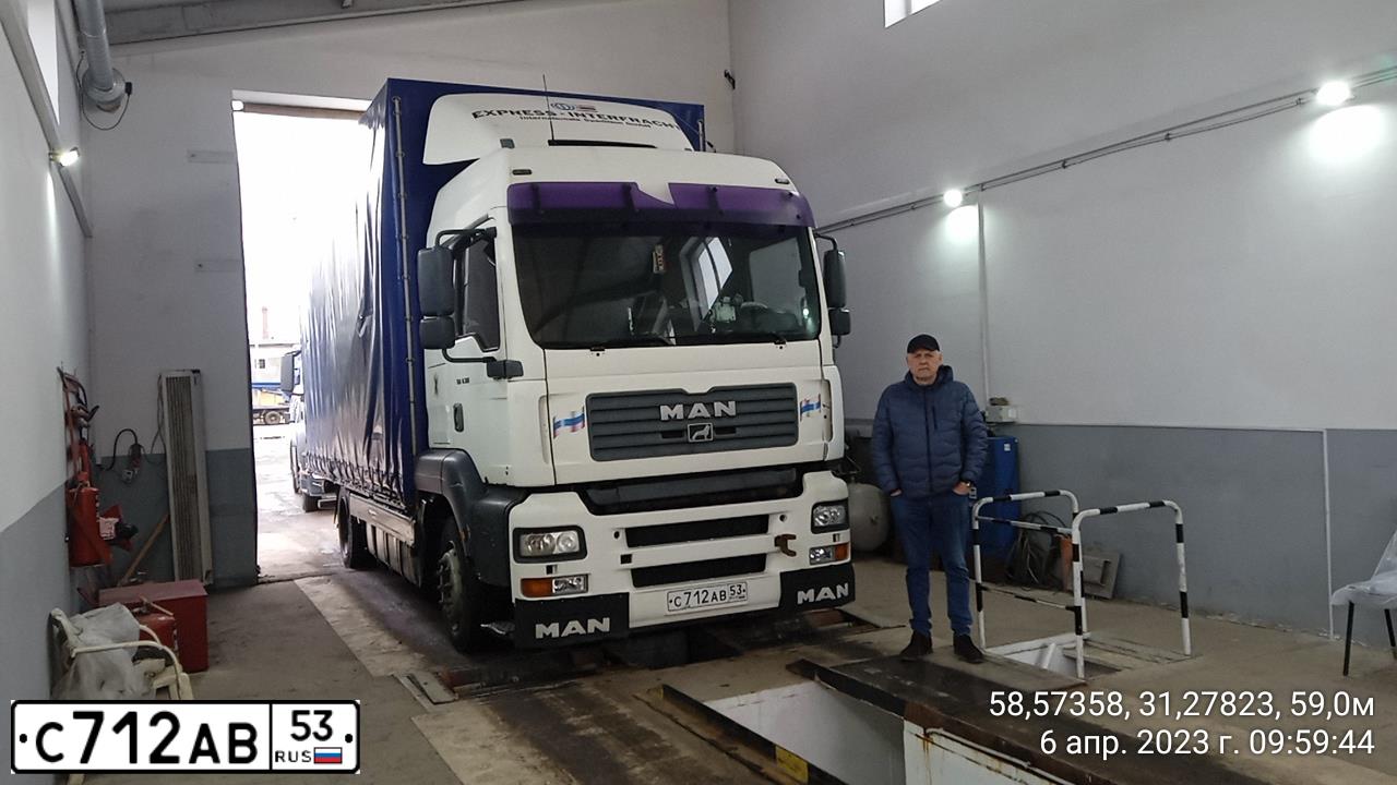 Фото автомобиля MAN TGA 18.XXX /4X2/, 2004 — госномер С712АВ53. Цвет: БЕЛЫЙ