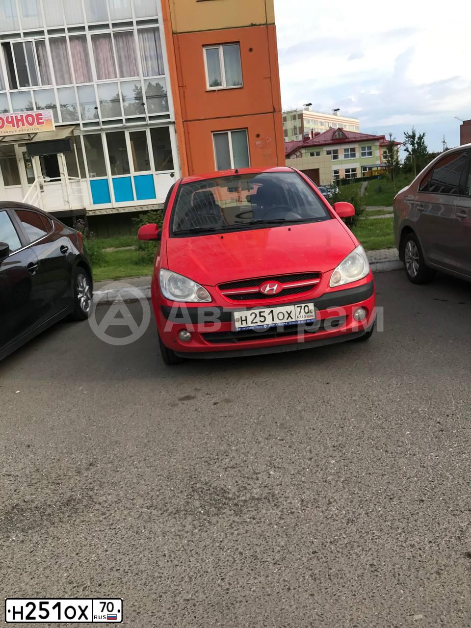 Фото автомобиля HYUNDAI GETZ, 2007 — госномер Н251ОХ70. Цвет: КРАСНЫЙ