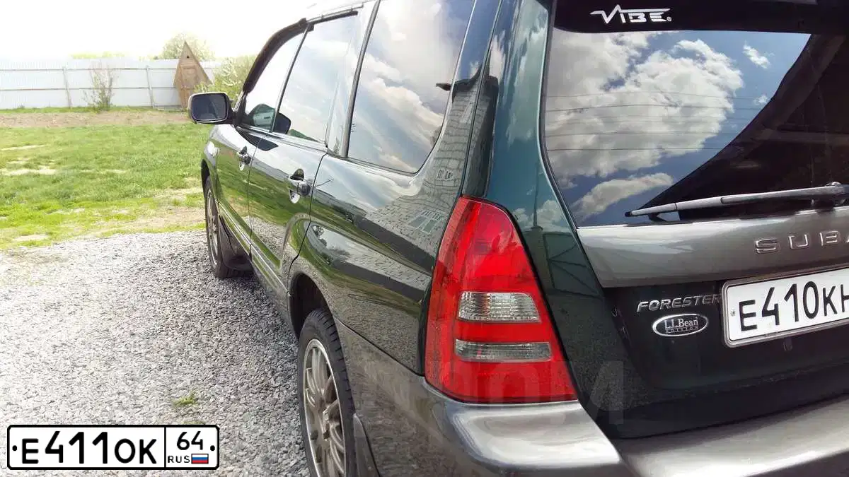 Фото автомобиля LADA 2110, 2004 — госномер Е411ОК64. Цвет: СИНЕ ЗЕЛЕНЫЙ