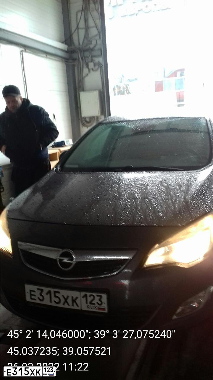 Фото автомобиля OPEL ASTRA, 2012 — госномер Р999СА123