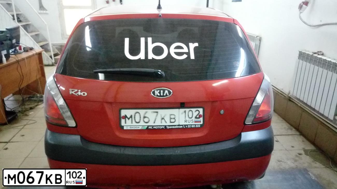 Фото автомобиля KIA RIO, 2009 — госномер В893МР702. Цвет: Красный