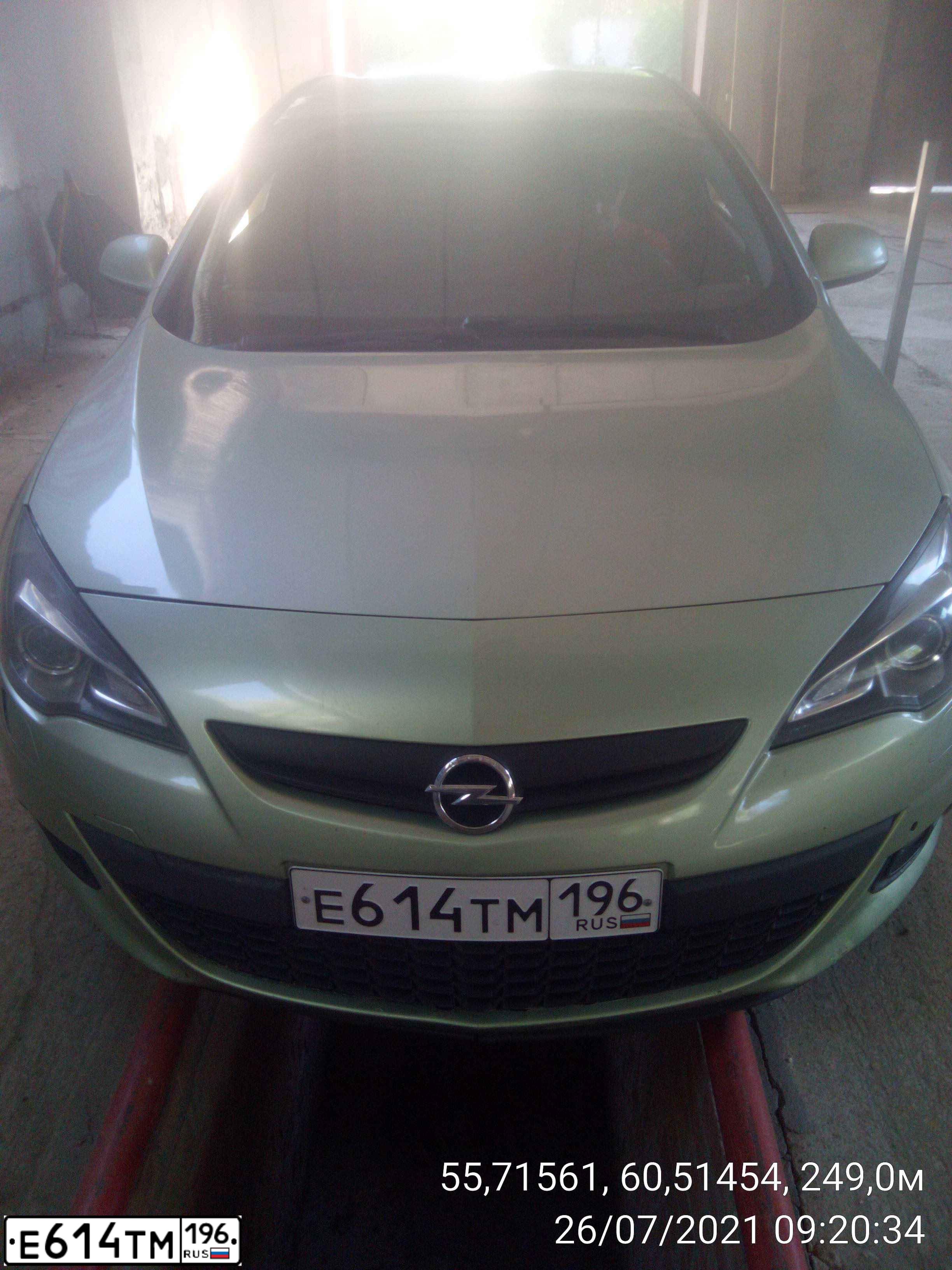 Фото автомобиля OPEL ASTRA, 2011 — госномер Е055НВ45. Цвет: СЕРО-ЗЕЛЕНЫЙ