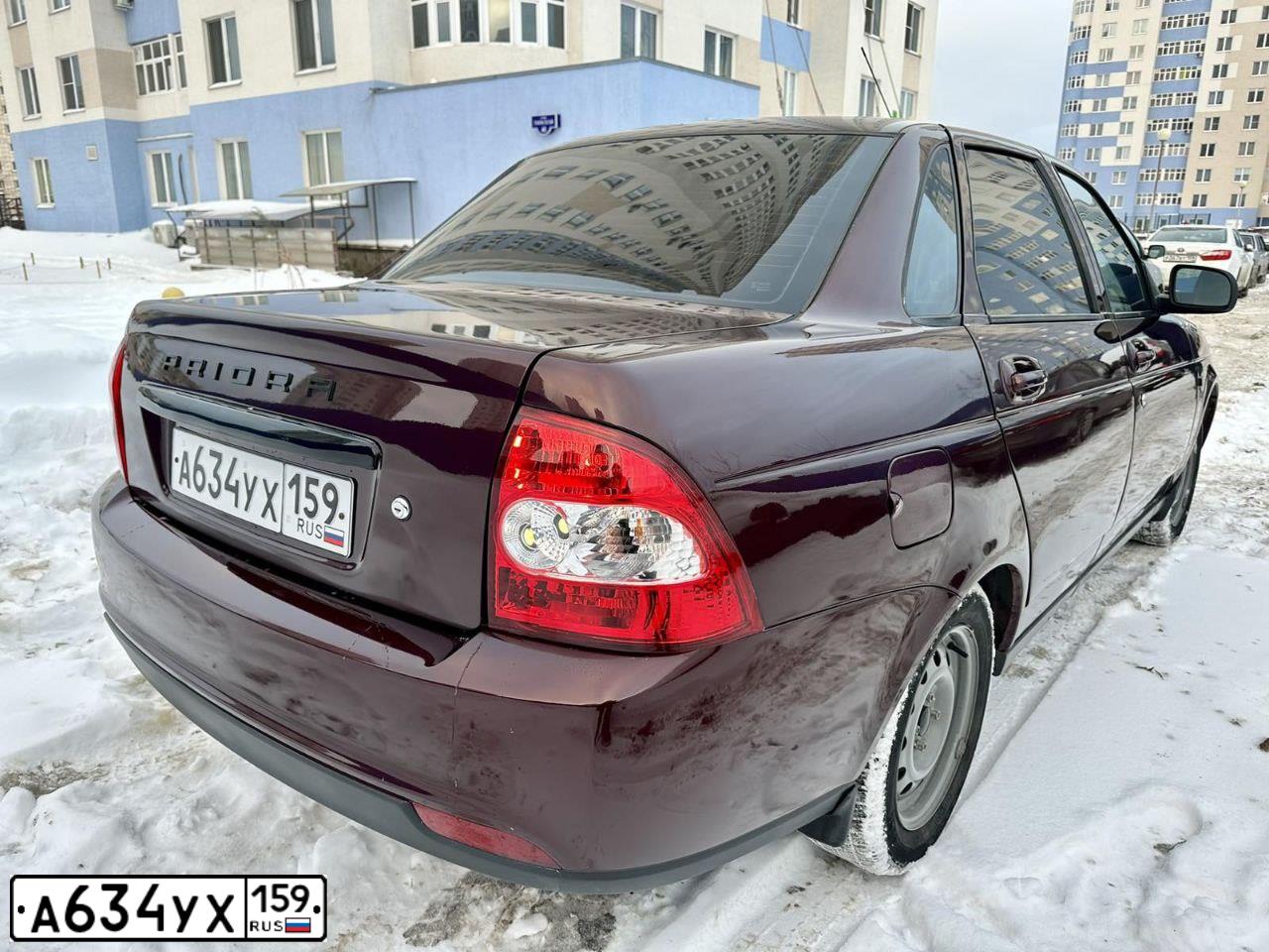Фото автомобиля LADA PRIORA, 2012 — госномер О162ХС159. Цвет: ТЕМНО-ВИШНЕВЫЙ