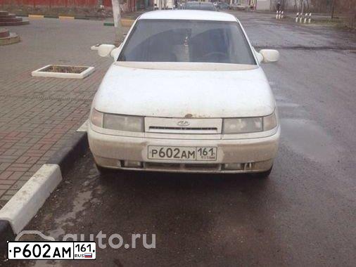 Фото автомобиля LADA 2112, 2001 — госномер Е631ЕА761. Цвет: ЯРКО-БЕЛЫЙ