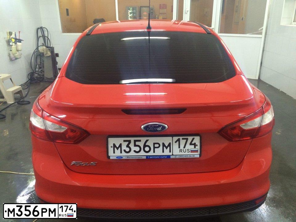 Фото автомобиля FORD FOCUS, 2012 — госномер М356РМ174. Цвет: Красный