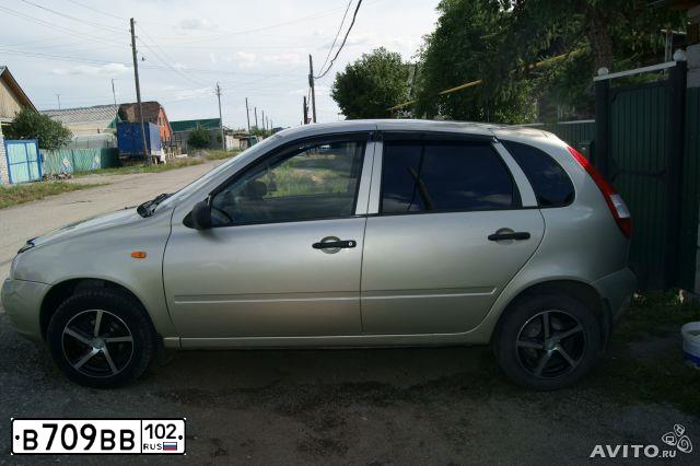 Фото автомобиля LADA KALINA, 2008 — госномер Х035ВС56. Цвет: БЕЛО-ЖЕЛТЫЙ ПЕРЛАМУТРОВЫЙ