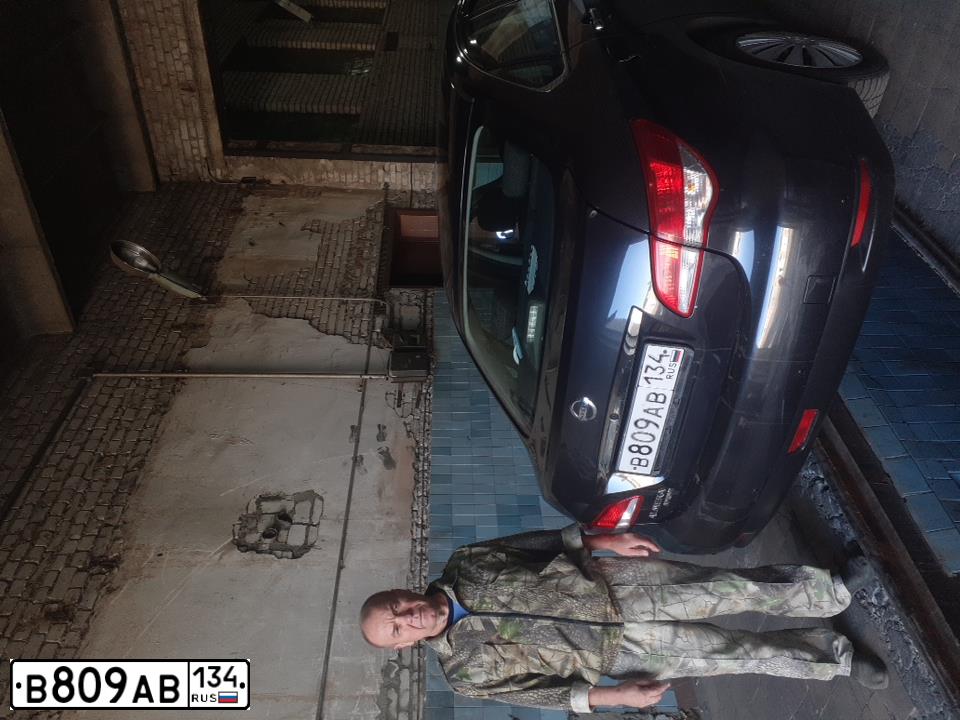 Фото автомобиля NISSAN ALMERA /AVTOVAZ/, 2014 — госномер В809АВ134. Цвет: ЧЕРНЫЙ