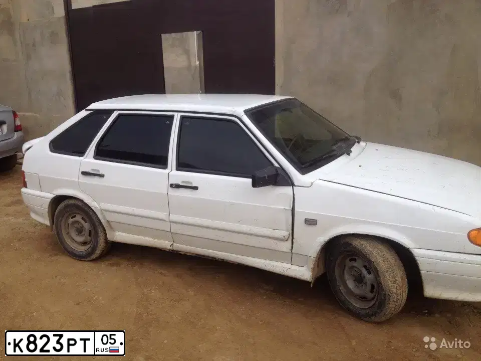 Фото автомобиля LADA 2114 SAMARA, 2006 — госномер О667ОХ05. Цвет: Белый