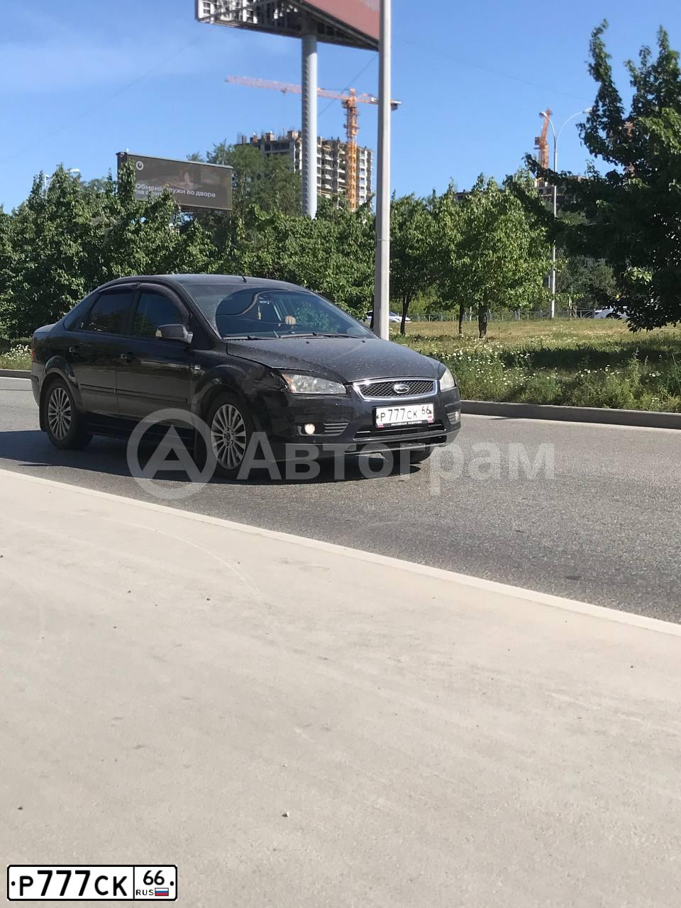Фото автомобиля FORD FOCUS, 2007 — госномер Р777СК66. Цвет: ЧЕРНЫЙ