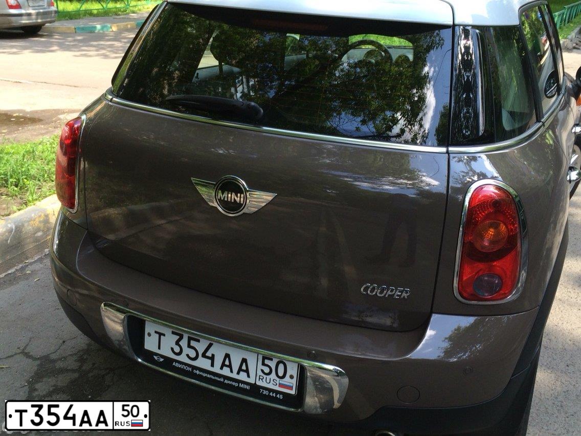Фото автомобиля KIA RIO, 2012 — госномер Т354АА50. Цвет: ЧЕРНЫЙ