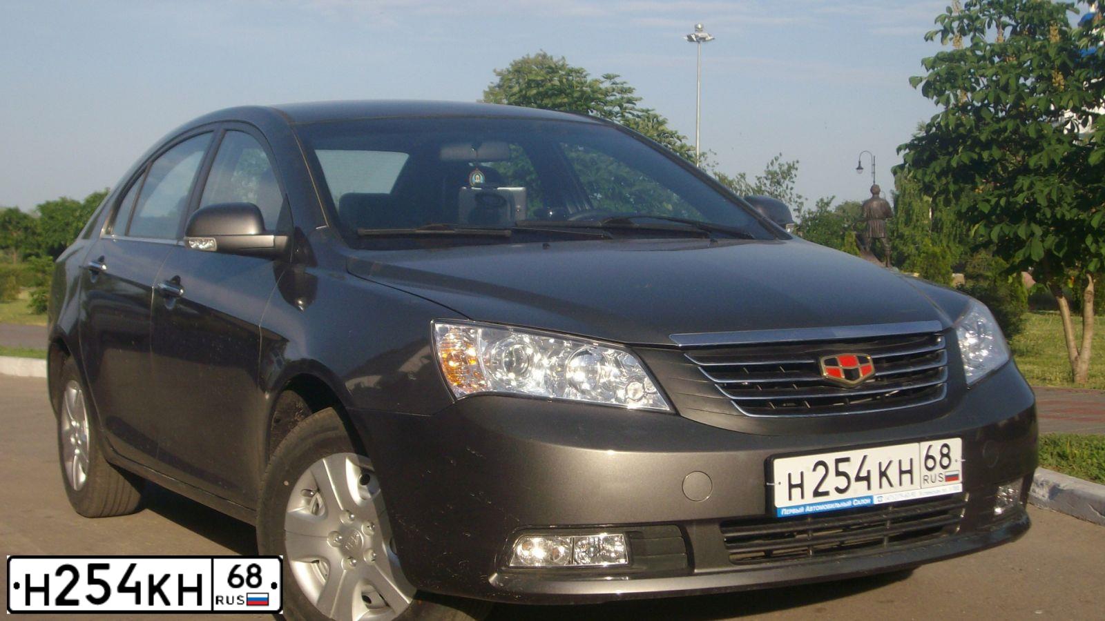 Фото автомобиля GEELY EMGRAND, 2013 — госномер Н254КН68. Цвет: СТАЛЬНОЙ (СЕРЫЙ)