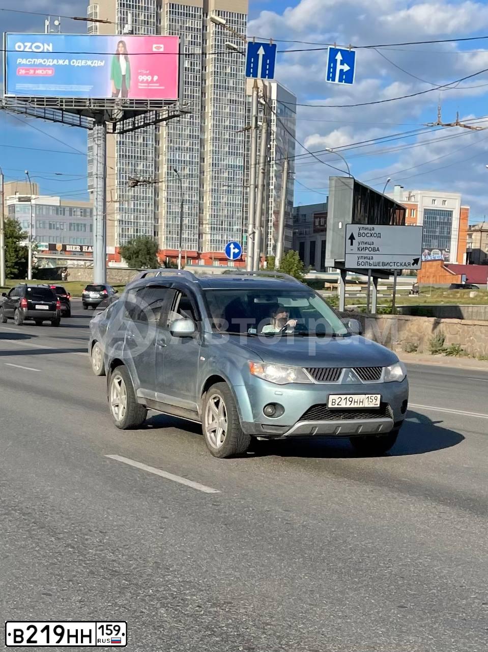 Фото автомобиля MITSUBISHI OUTLANDER, 2007 — госномер В219НН159. Цвет: СВЕТЛО-СЕРО-ЗЕЛЕНЫЙ