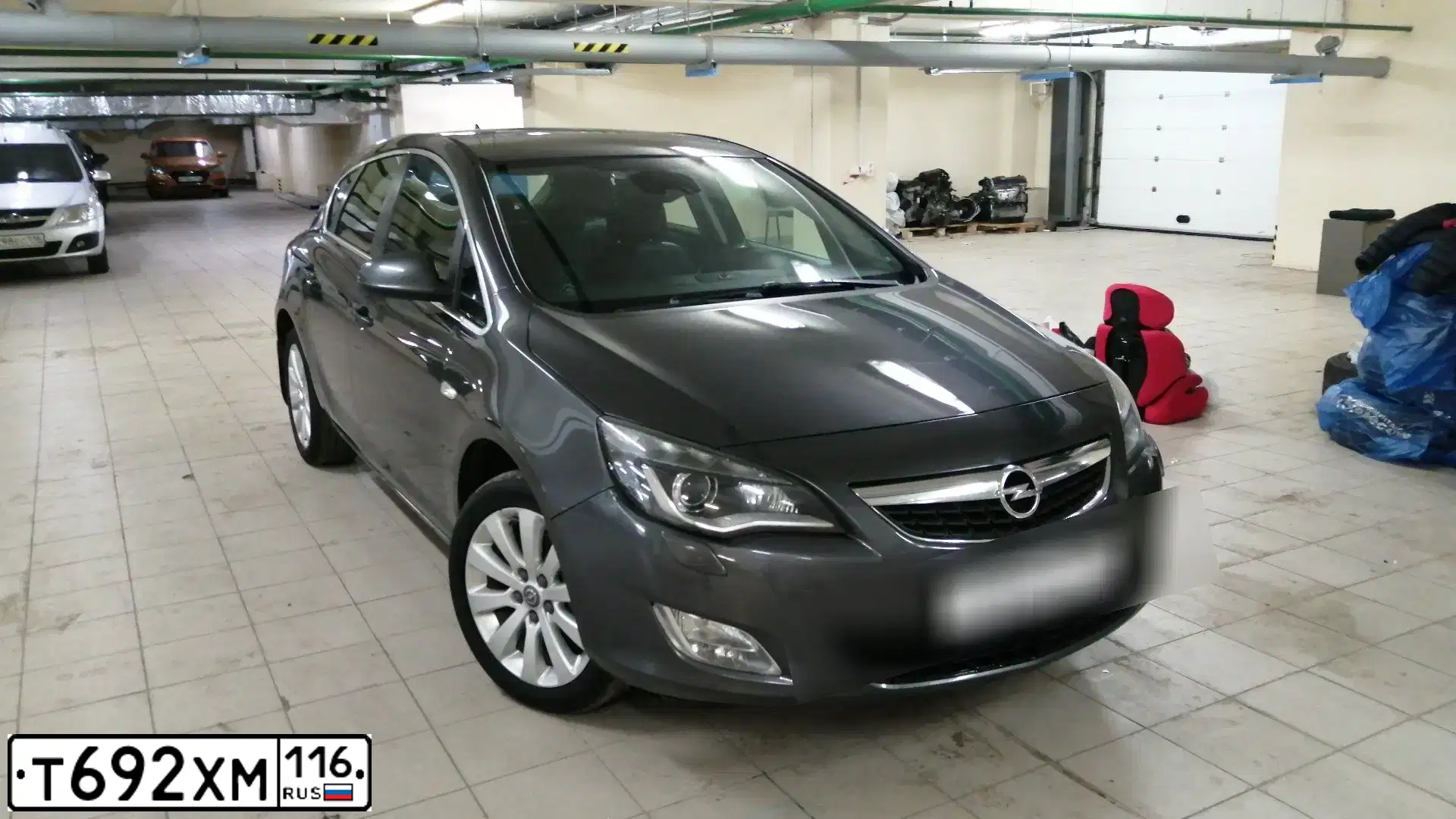Фото автомобиля OPEL ASTRA, 2010 — госномер Е052ЕК716. Цвет: СЕРЫЙ МЕТАЛЛИК