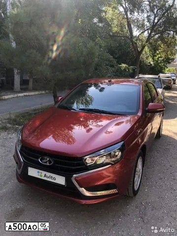 Фото автомобиля LADA VESTA, 2016 — госномер Т263РР05. Цвет: Красный