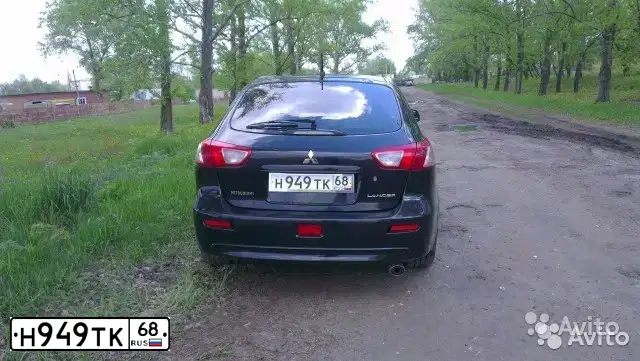 Фото автомобиля MITSUBISHI LANCER, 2008 — госномер Н949ТК68. Цвет: ЧЕРНЫЙ