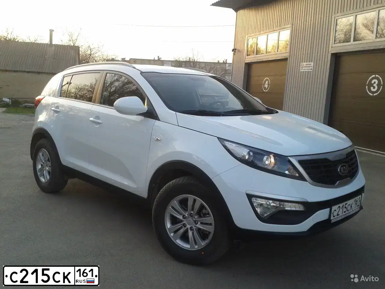 Фото автомобиля KIA SPORTAGE, 2014 — госномер С215СК161. Цвет: БЕЛЫЙ