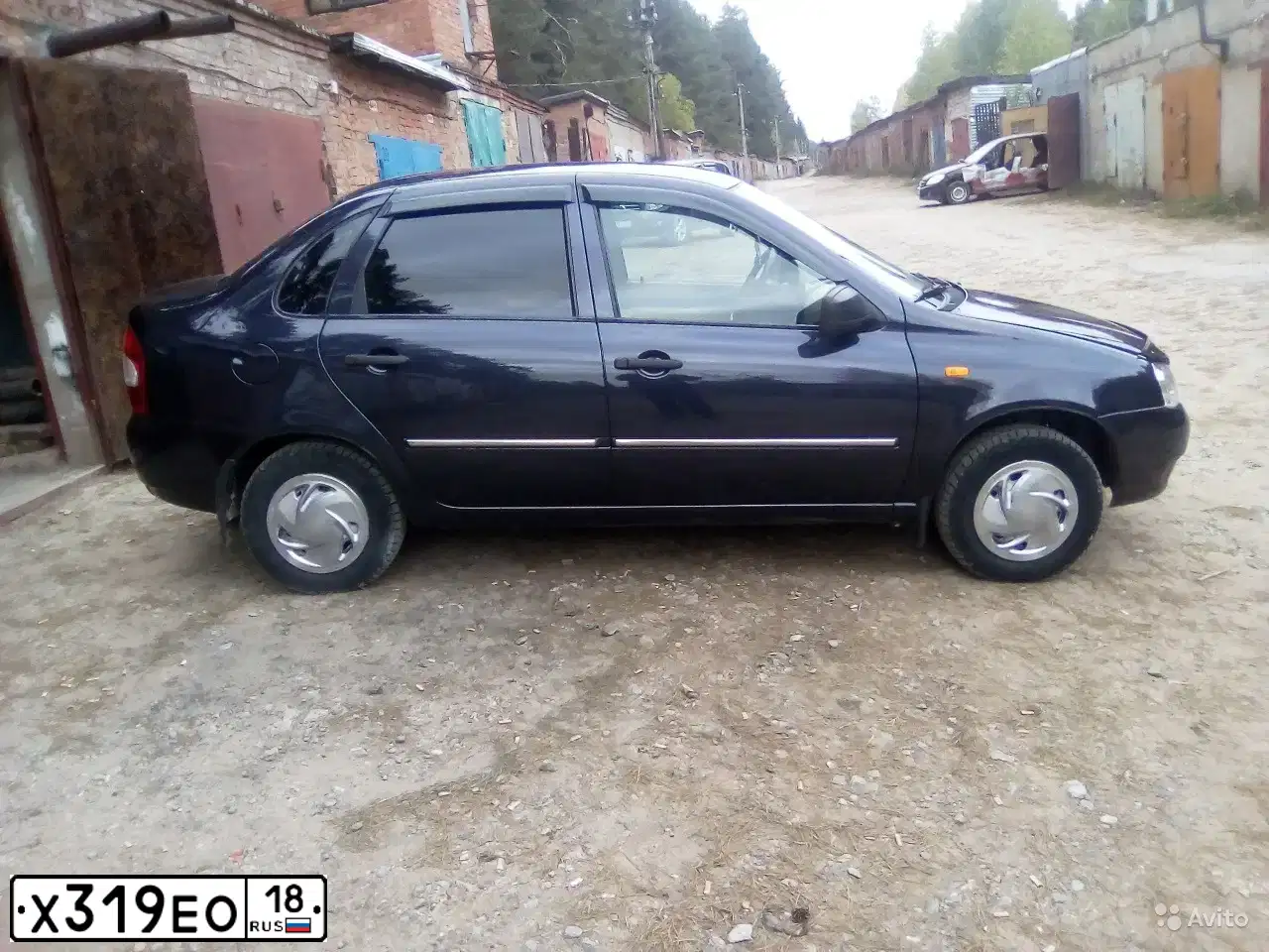 Фото автомобиля LADA 1118 KALINA, 2009 — госномер Х319ЕО18. Цвет: СИНЕ-ФИОЛЕТОВЫЙ
