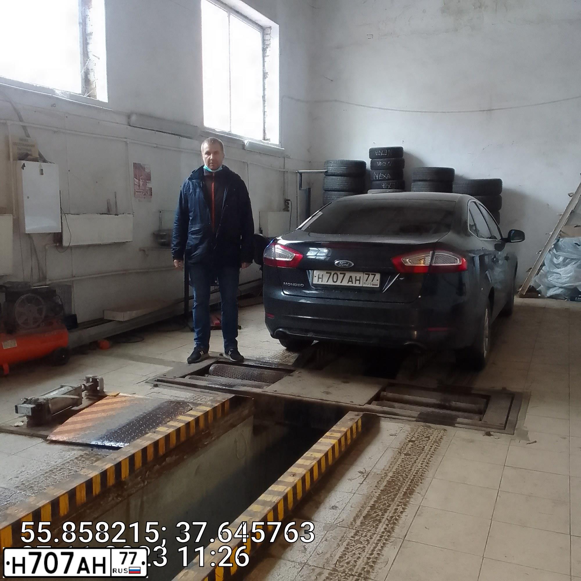 Фото автомобиля FORD MONDEO, 2012 — госномер Н707АН77. Цвет: ЧЕРНЫЙ