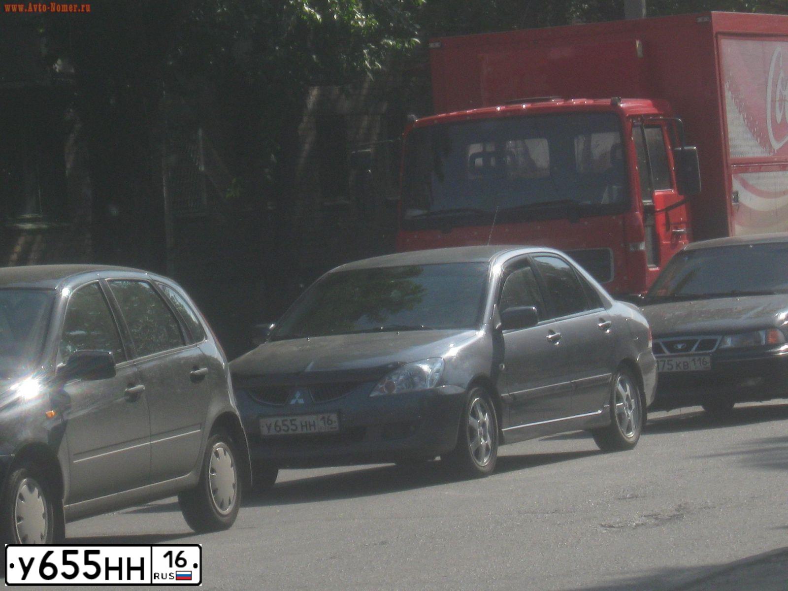 Фото автомобиля MITSUBISHI LANCER, 2005 — госномер Е491ВХ11. Цвет: СЕРЫЙ