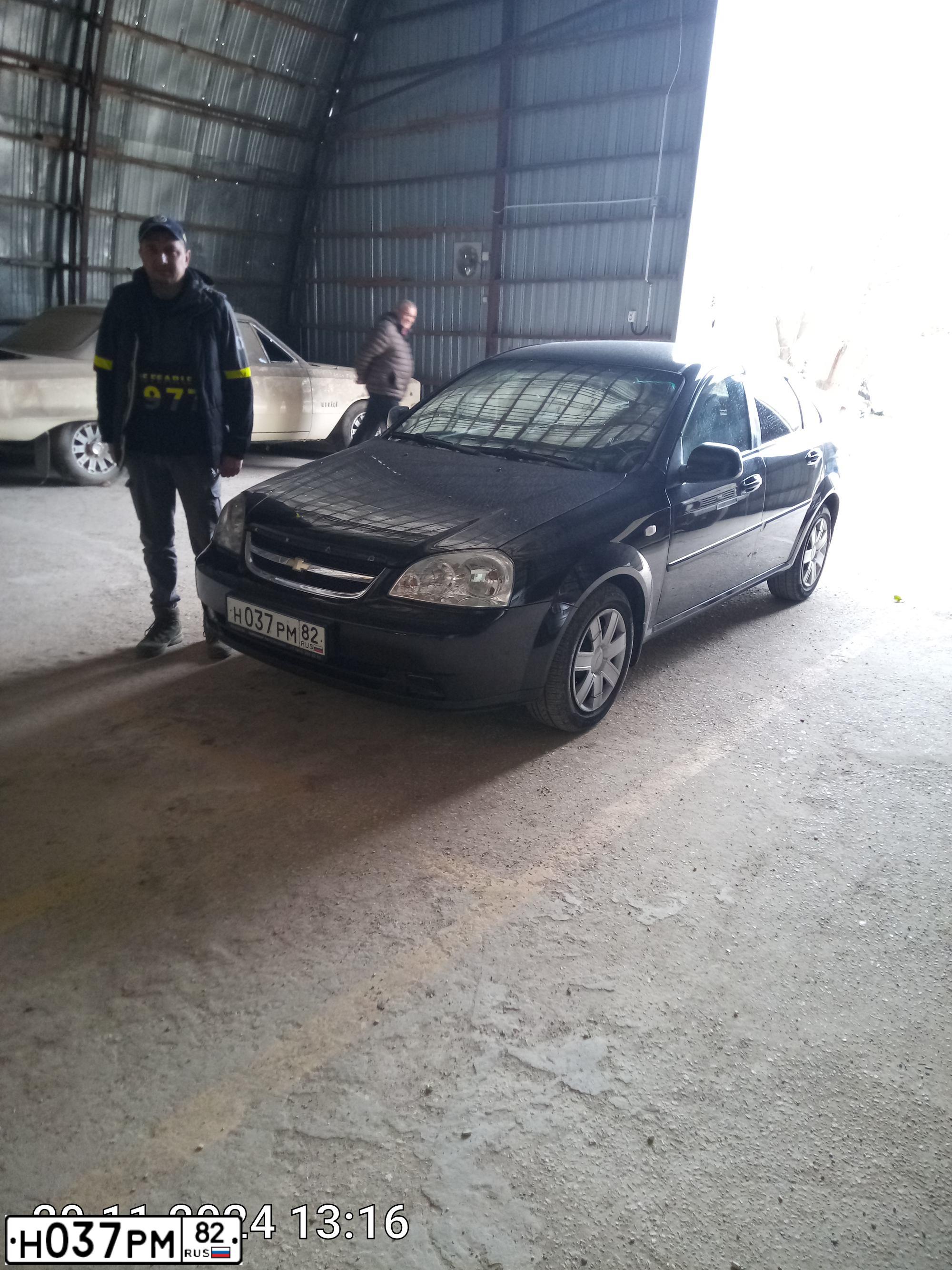 Фото автомобиля CHEVROLET T LACETTI, 2012 — госномер Н037РМ82. Цвет: ЧЕРНЫЙ