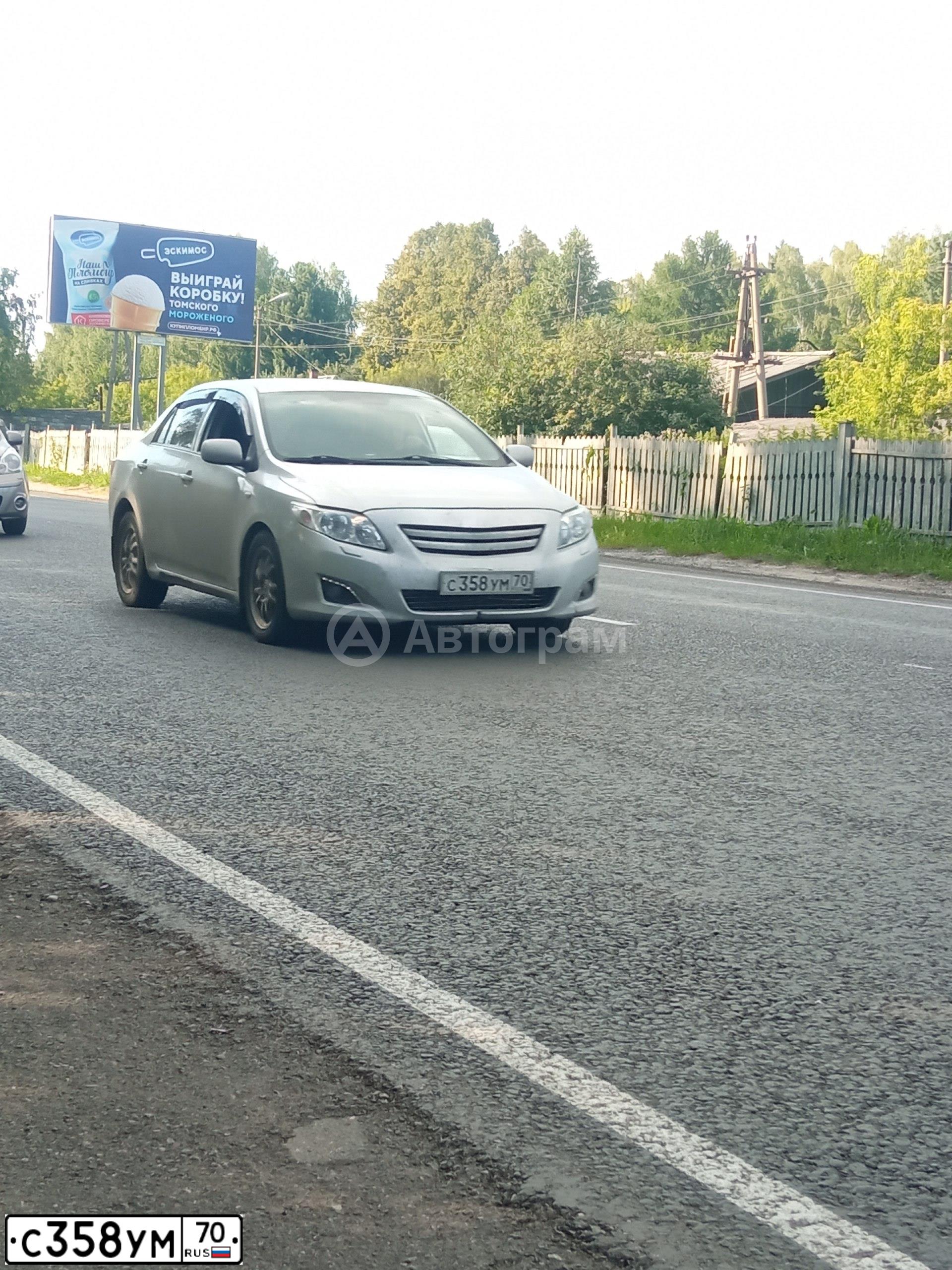 Фото автомобиля TOYOTA COROLLA, 2007 — госномер К665ОТ142. Цвет: Серебристый