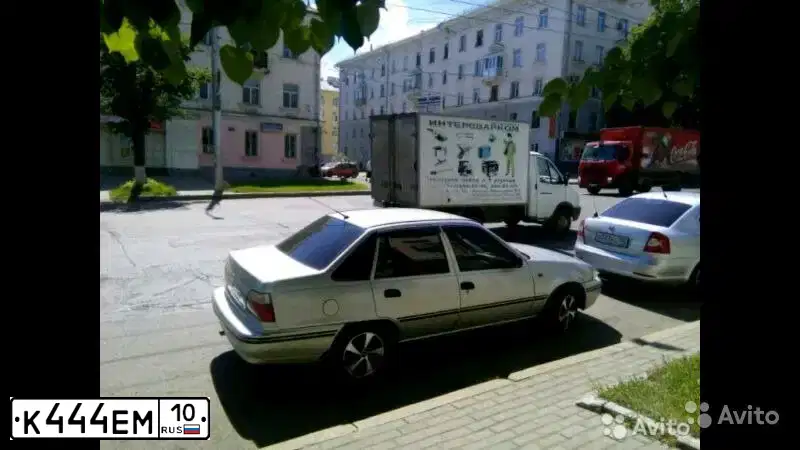 Фото автомобиля MITSUBISHI CARISMA HB 1.6, 2003 — госномер Н844НО10. Цвет: Серебристый
