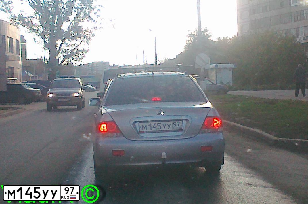 Фото автомобиля MITSUBISHI LANCER, 2005 — госномер В213ХС37. Цвет: Серебристый