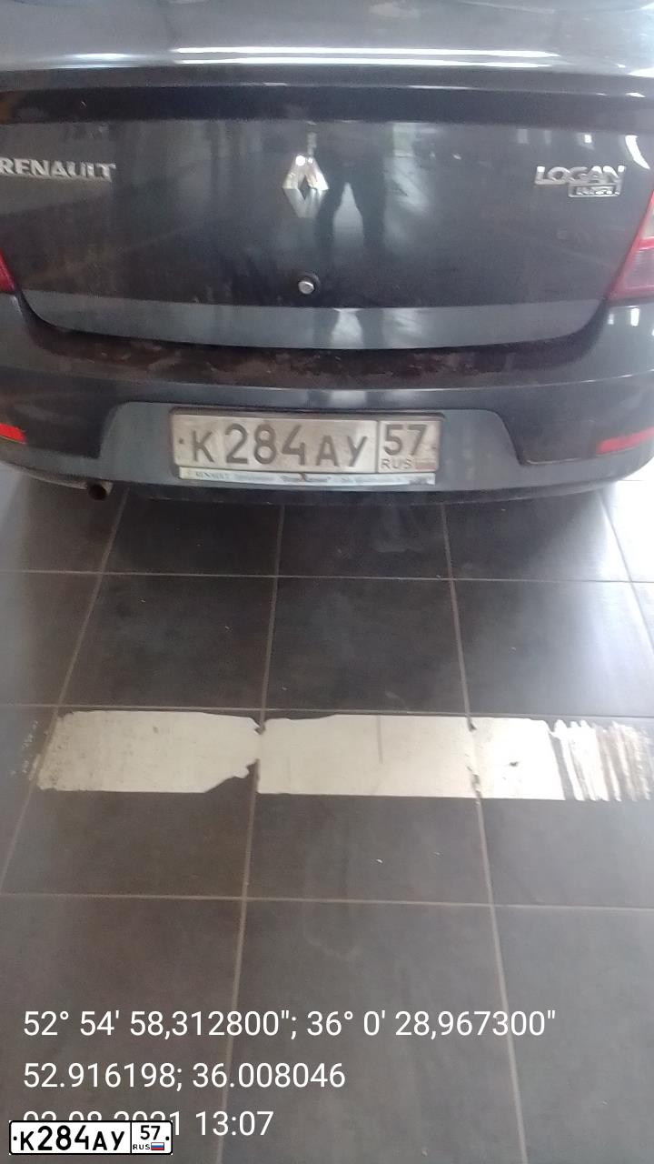 Фото автомобиля RENAULT LOGAN, 2010 — госномер К284АУ57. Цвет: ТЕМНО-СЕРЫЙ