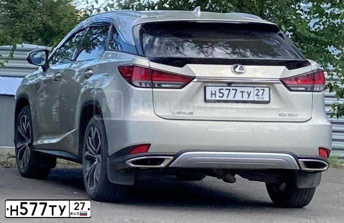 Фото автомобиля LEXUS RX, 2010 — госномер У384УК27. Цвет: Коричневый
