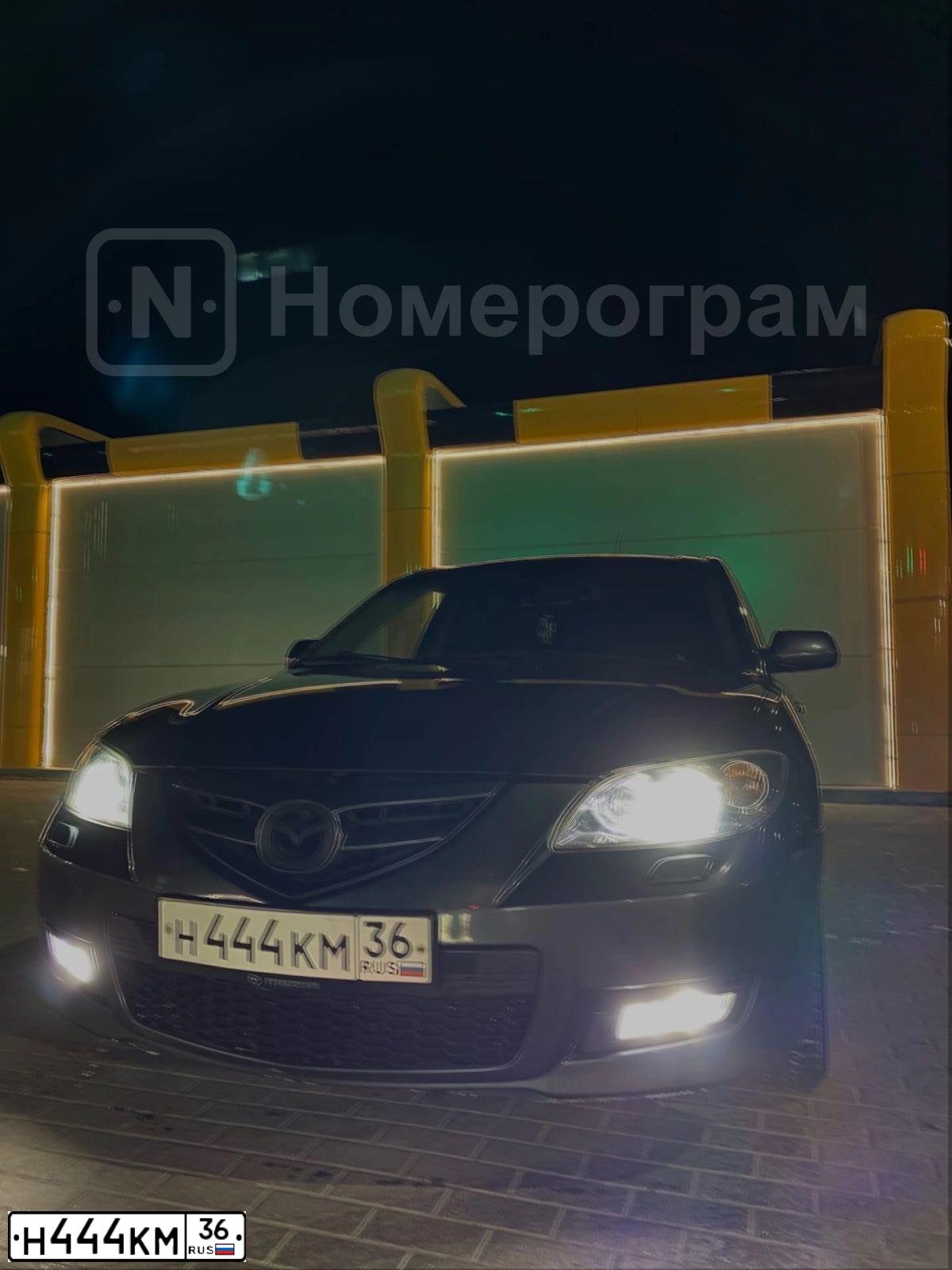 Фото автомобиля MAZDA 3, 2008 — госномер Е004ТХ197. Цвет: СЕРЫЙ