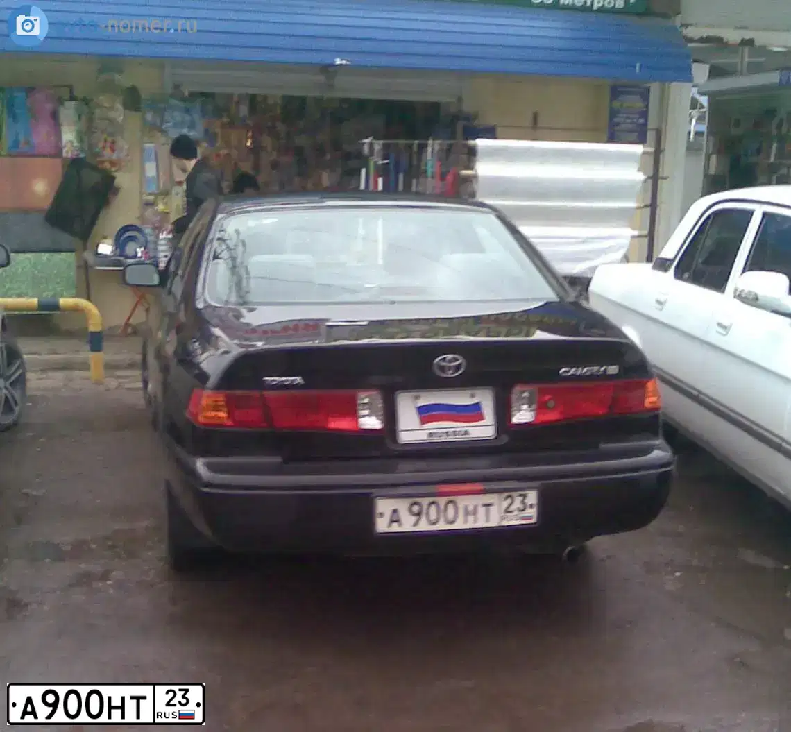 Фото автомобиля HYUNDAI SANTA FE, 2011 — госномер Т485ЕР05. Цвет: ТЕМНО-СЕРЫЙ