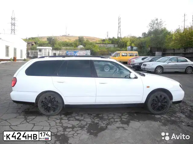Фото автомобиля NISSAN PRIMERA, 2001 — госномер К424НВ174. Цвет: БЕЛЫЙ