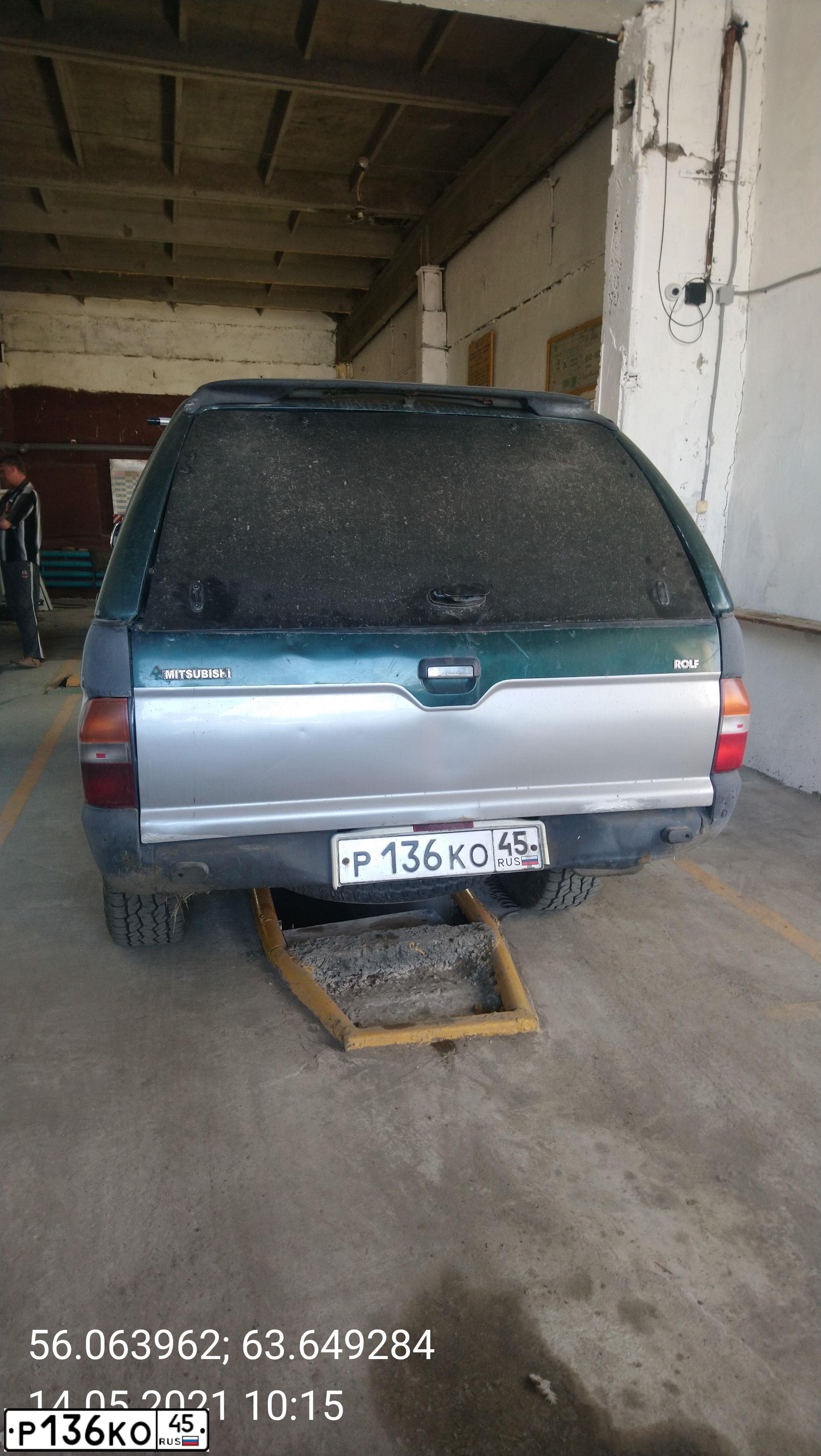 Фото автомобиля MITSUBISHI L 200, 1999 — госномер Р136КО45. Цвет: СЕРО-ЗЕЛЕНЫЙ