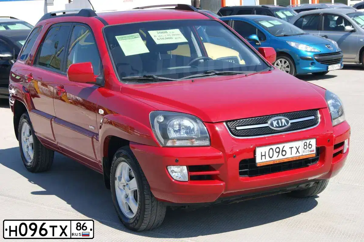 Фото автомобиля KIA SPORTAGE, 2008 — госномер О292ТТ124. Цвет: Красный