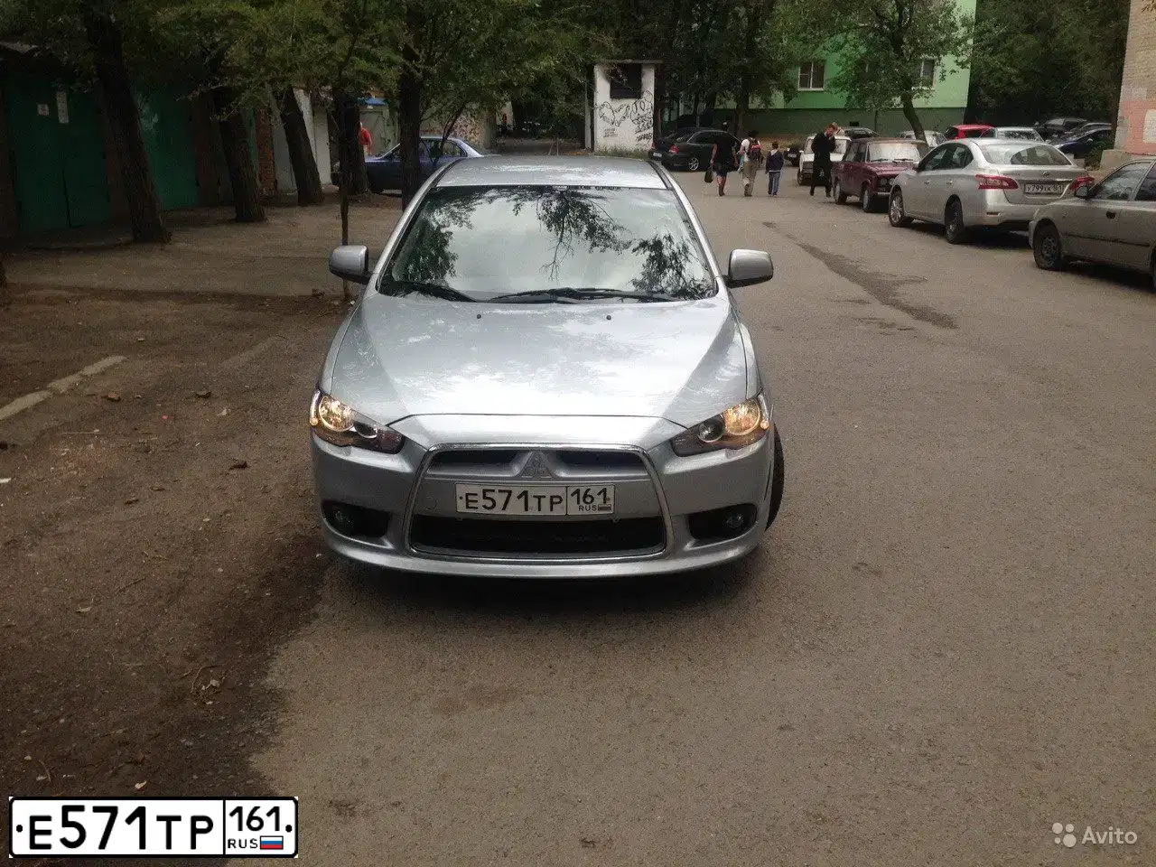 Фото автомобиля MITSUBISHI LANCER, 2013 — госномер М861ВМ82. Цвет: Серебристый