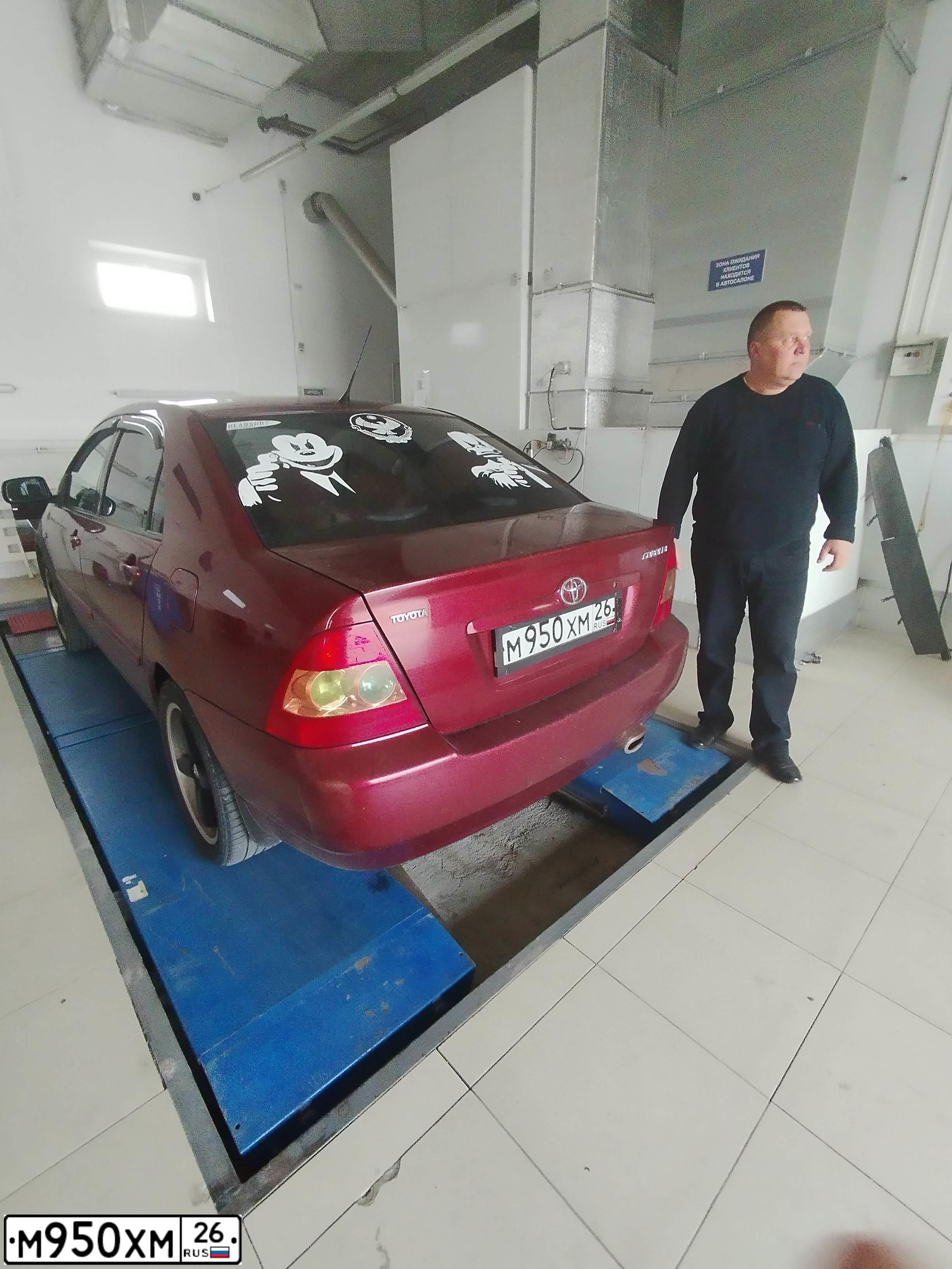 Фото автомобиля TOYOTA COROLLA, 2006 — госномер А200ТО26. Цвет: ТЕМНО-КРАСНЫЙ