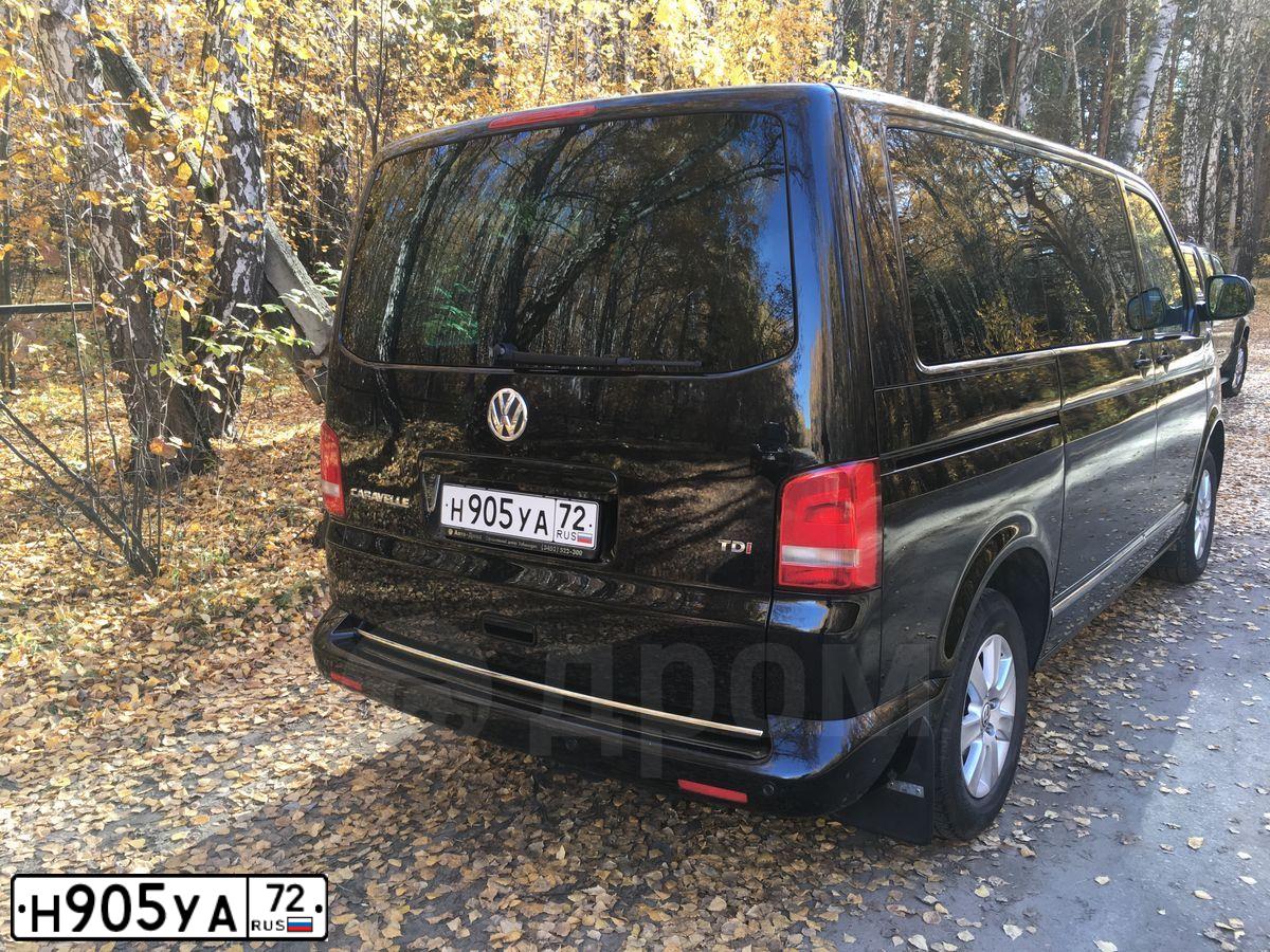 Фото автомобиля VOLKSWAGEN CARAVELLE, 2011 — госномер Н905УА72. Цвет: ЧЕРНЫЙ