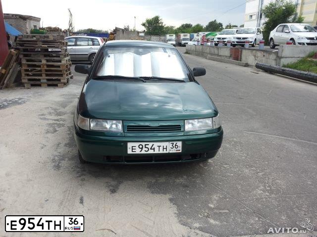 Фото автомобиля LADA 2112, 2002 — госномер Е954ТН36. Цвет: Темно-зеленый