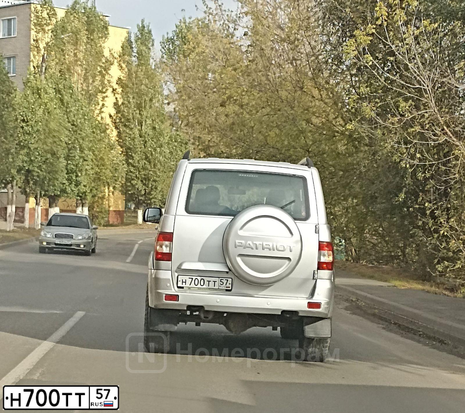 Фото автомобиля SSANGYONG KYRON, 2010 — госномер Н700ТТ57. Цвет: ЧЕРНЫЙ