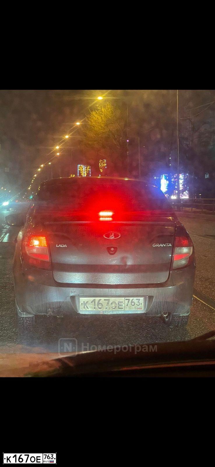 Фото автомобиля LADA 2190 GRANTA, 2015 — госномер К167ОЕ763. Цвет: ЧЕРНЫЙ