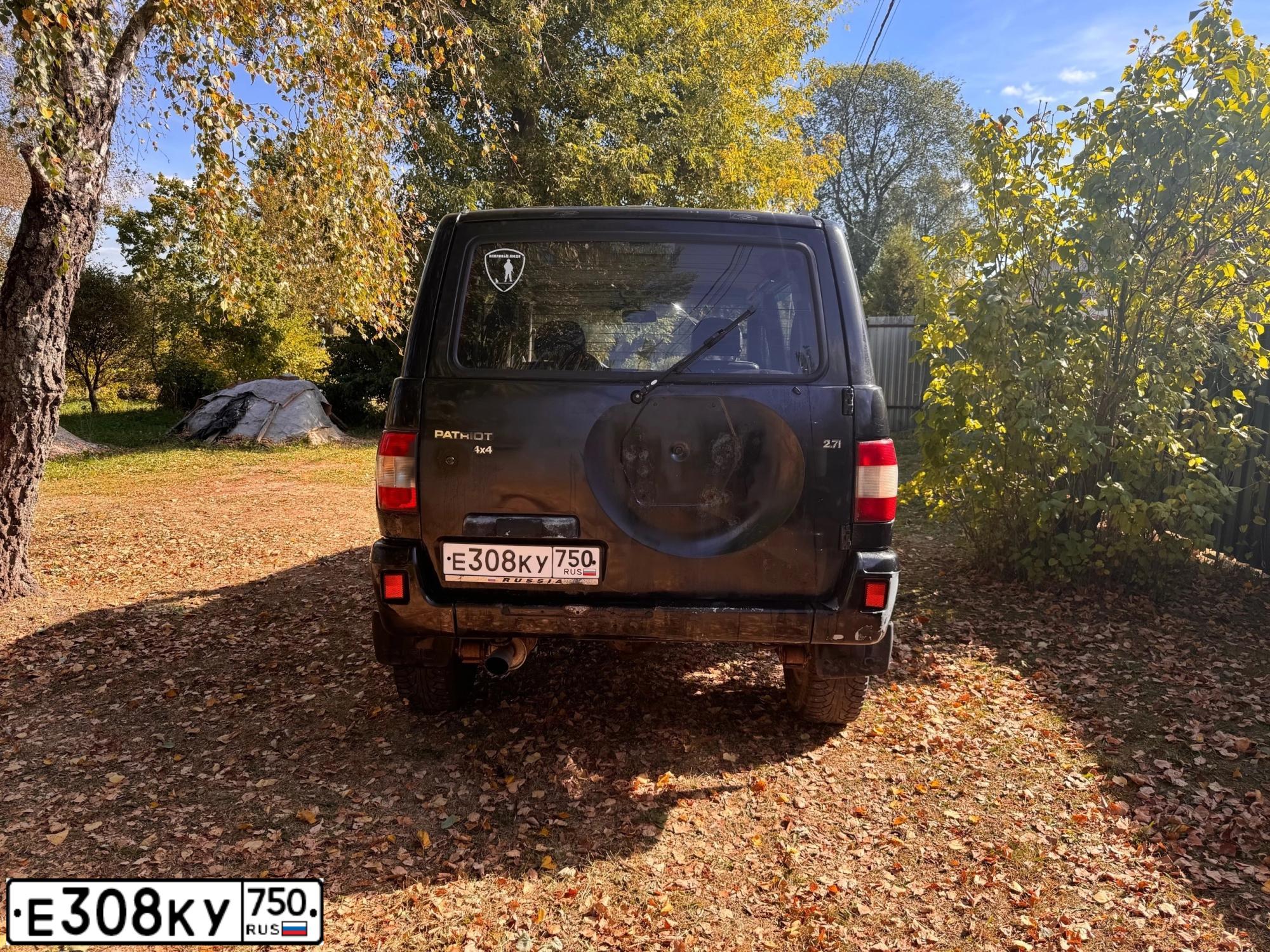 Фото автомобиля УАЗ ПАТРИОТ, 2005 — госномер Е763АМ09. Цвет: ЧЕРНЫЙ