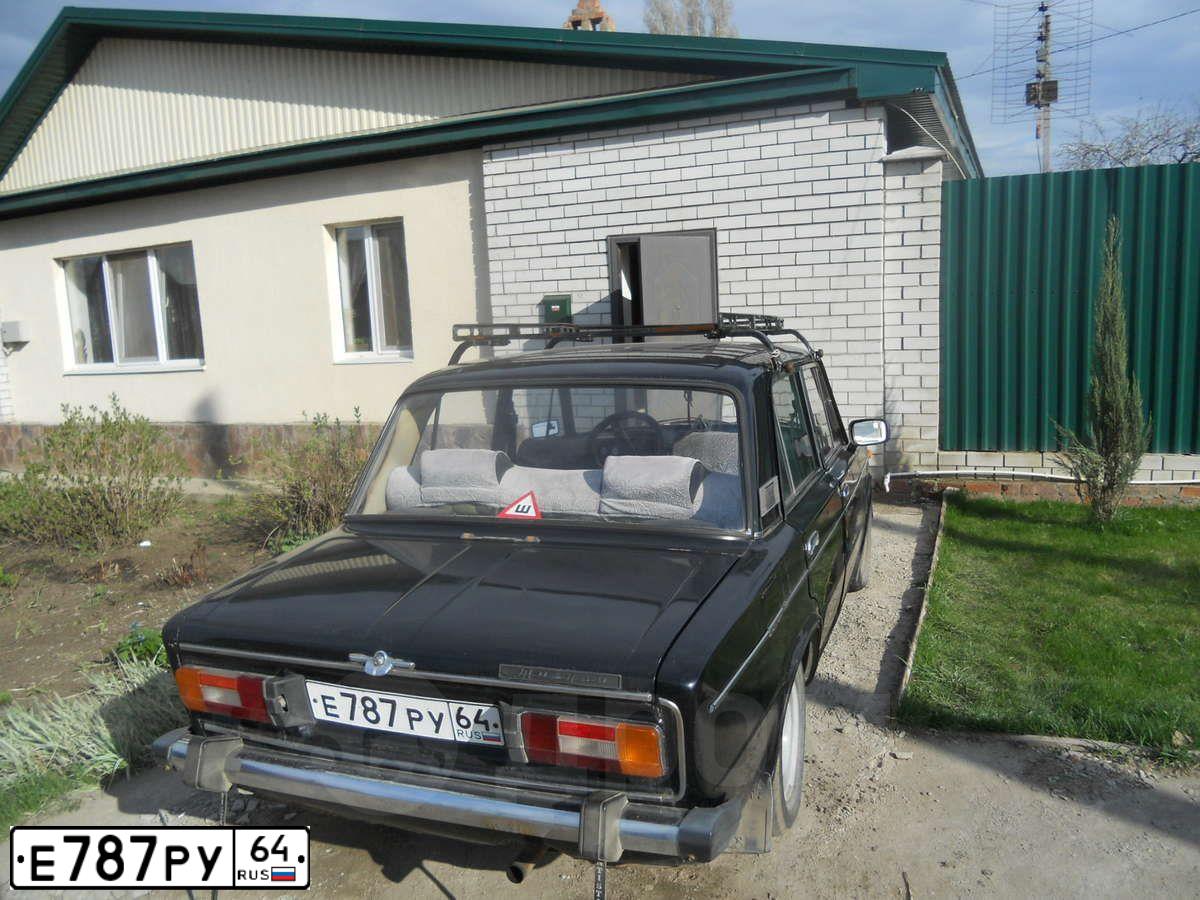 Фото автомобиля LADA 2106, 1996 — госномер Е787РУ64. Цвет: ЧЕРНЫЙ