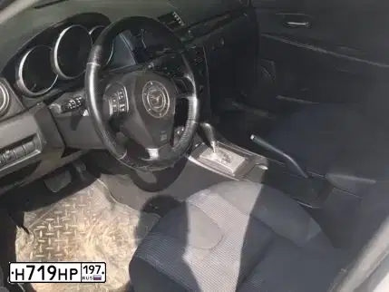 Фото автомобиля MAZDA 3, 2004 — госномер О523СС193. Цвет: СЕРЫЙ