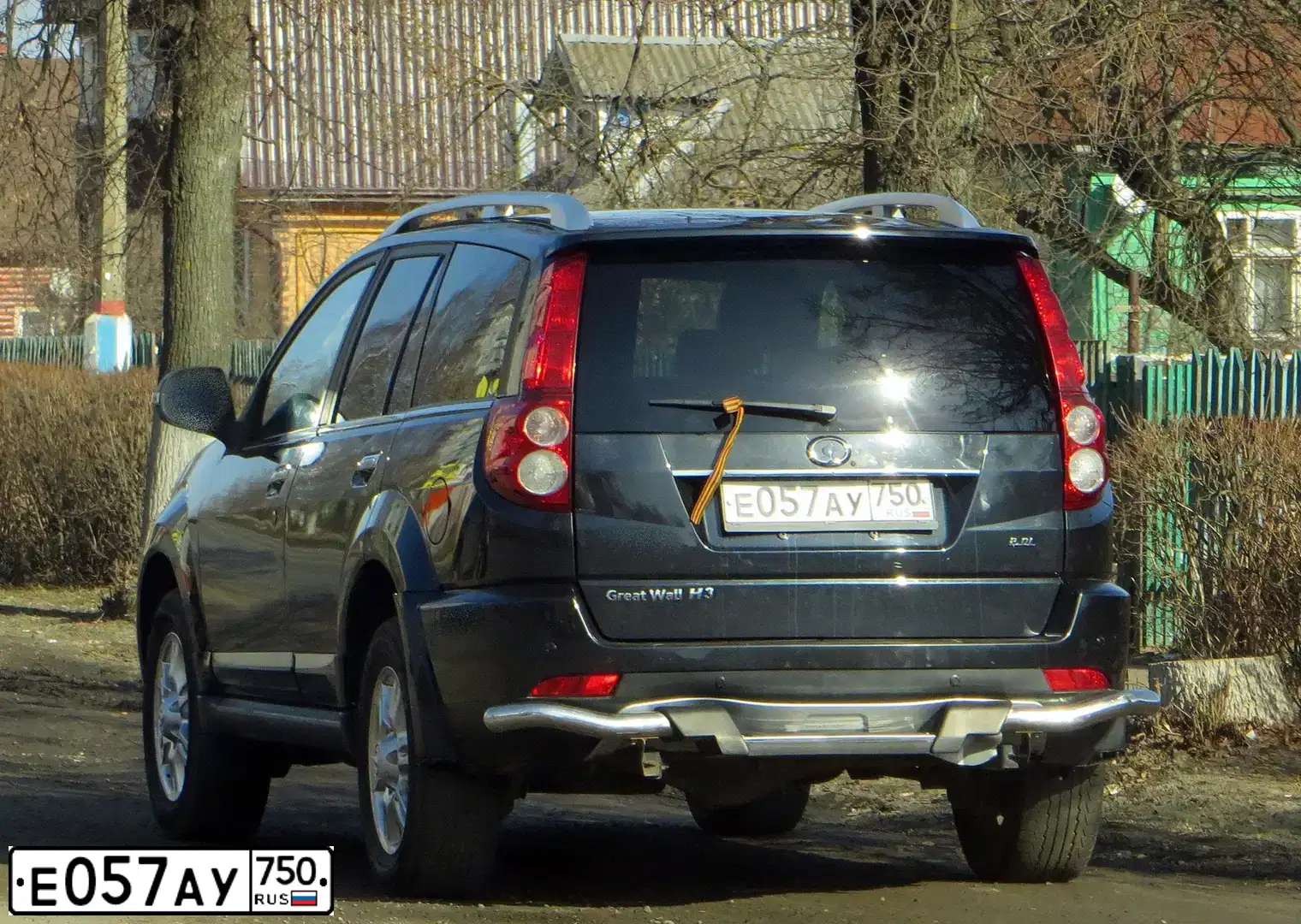 Фото автомобиля GREAT WALL HOVER, 2014 — госномер Е057АУ750. Цвет: ЧЕРНЫЙ