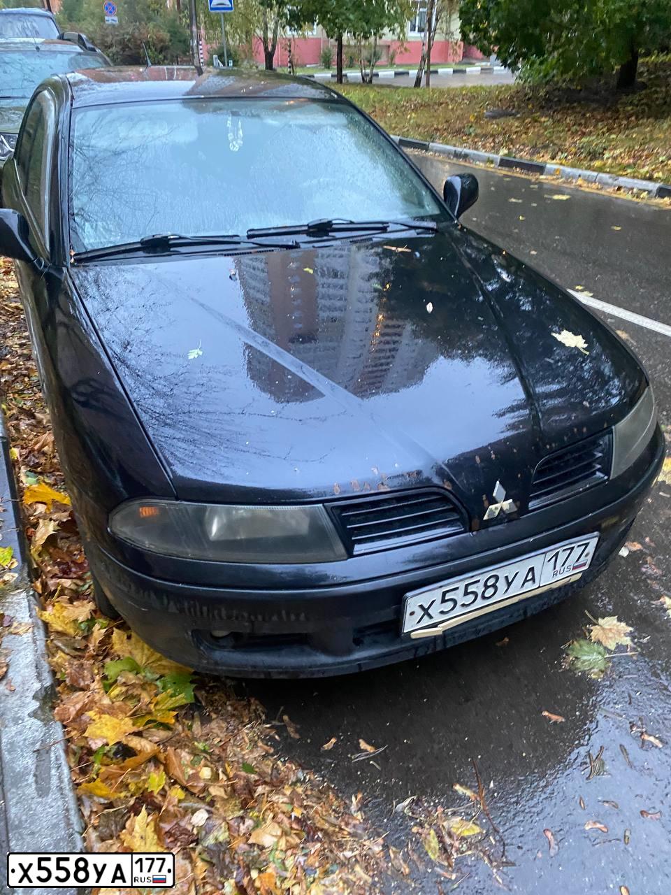 Фото автомобиля MITSUBISHI CARISMA, 2003 — госномер Х558УА177