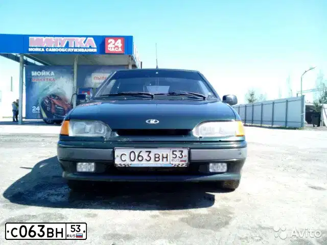 Фото автомобиля LADA 2114 SAMARA, 2004 — госномер С063ВН53. Цвет: Темно-зеленый